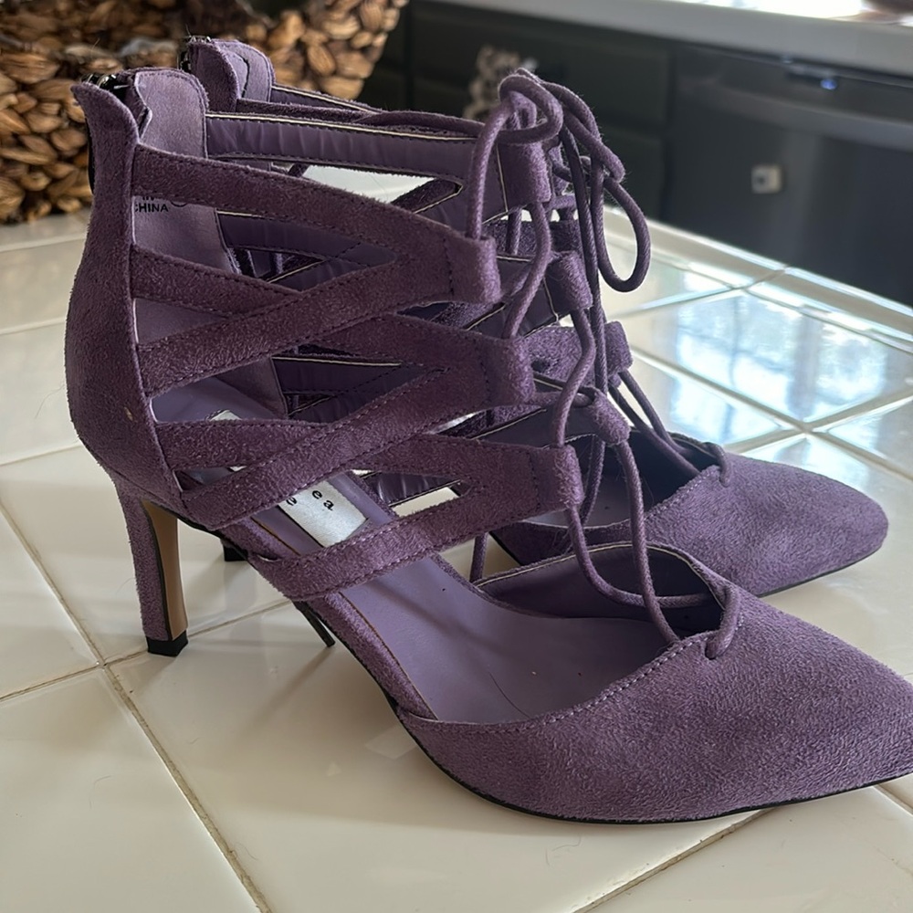 Fun color alert ! Make a statement in these cute heels .